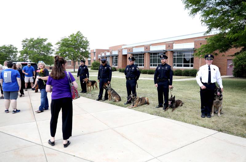 Area K9 units line up outside a funeral in honor of Kane County Sheriff K9 Hudson, who lost his life in the line of duty last month, on Thursday, June 1, 2023 at Kaneland Harter Middle School in Sugar Grove.