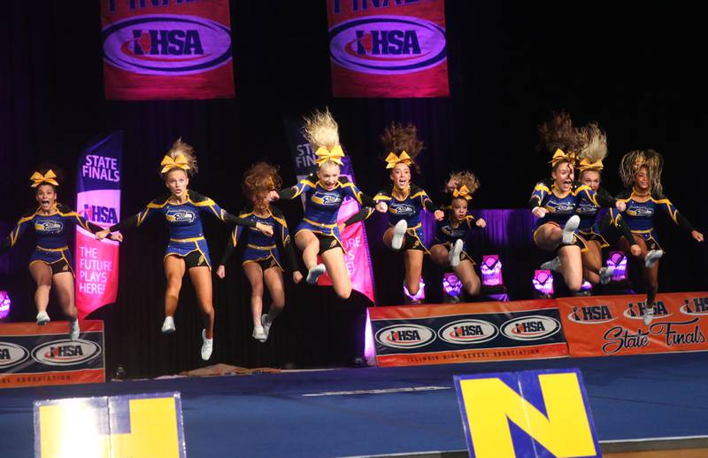 Members of the Johnsburg cheerleading team perform at the Competitive Cheerleading State Final Competition on Saturday, Feb. 3, 2024 at Grossinger Motors Arena in Bloomington.