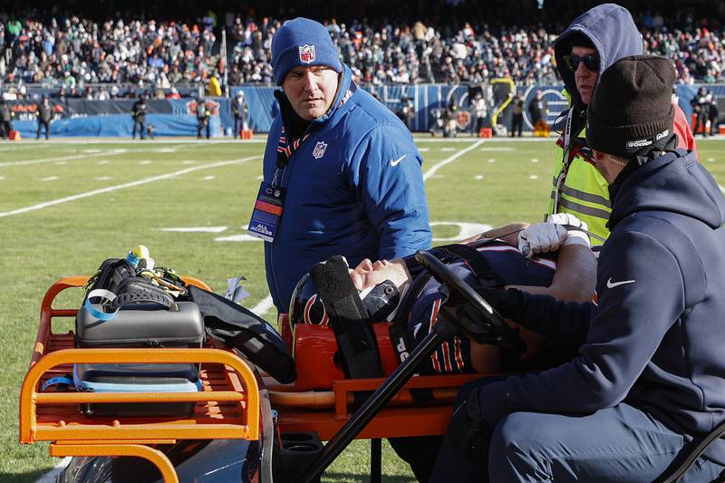 Chicago Bears offensive tackle Teven Jenkins is carted off the field after an injury during the first half against the Philadelphia Eagles, Sunday, Dec. 18, 2022, in Chicago.