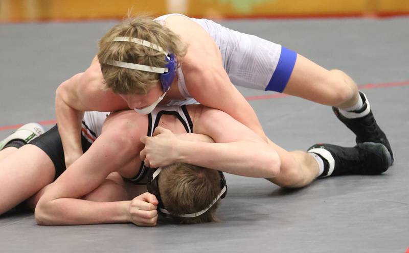 Princeton's Agustus Swanson wrestles Kaneland's Cooper Yakel during a meet on Thursday, Jan. 22, 2026 in Sellett Gymnasium at L-P High School.