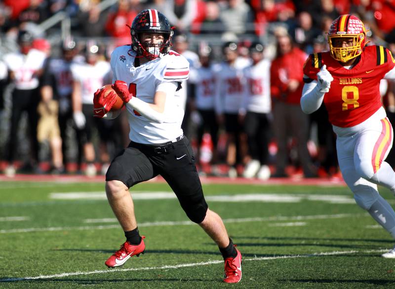 Lincoln-Way Central’s Braden Meyer carries the ball during the Class 7A second round playoff game against Batavia in Batavia on Saturday, Nov. 4, 2023.