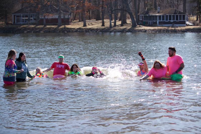Locals take the plunge at the St. Charles Police and Fire Annual Polar Plunge at Ferson Creek Park on Sunday, March 9,2025 in St. Charles.