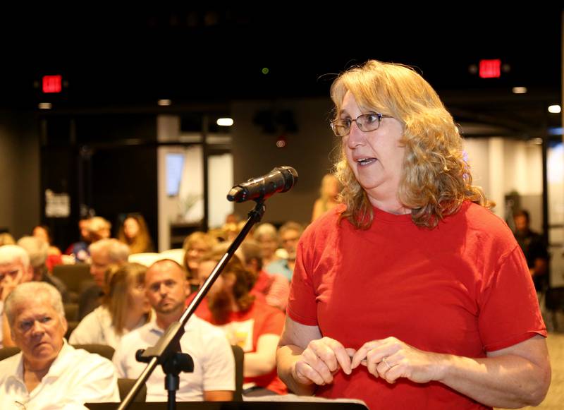 Beth Ball of Elburn speaks as a person impacted by the Crown Development at the Special Plan Commission Meeting on Monday, Aug. 12, 2024 in Sugar Grove.