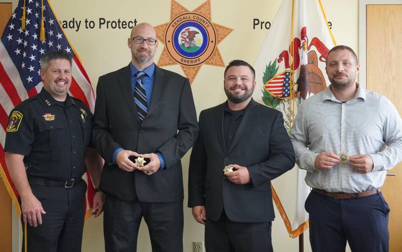 Kendall County  Undersheriff Bobby Richardson (from left) is seen with new deputies Scott Bialas, Kyle Long and Justin Hunt.