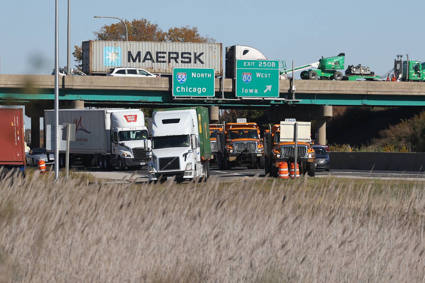 Southbound I-55 traffic is rerouted off the interstate. A crash involving two semitrailers shutdown down southbound I-55 as diesel fuel, water bottles and soybeans covered all lanes of Interstate 55 south of the I-80 interchange early Wednesday morning.