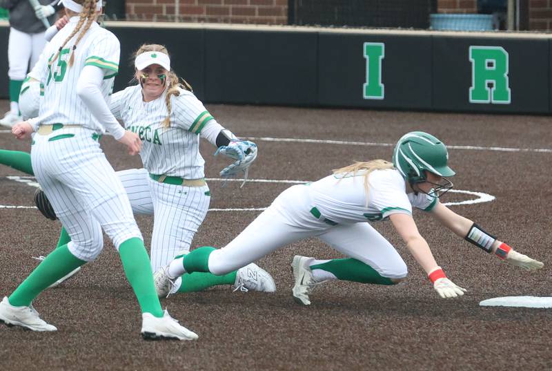 Seneca's Emma Mino misses the tag on Geneseo's Megan Hursman at second base on Thursday, March 12, 2026 at Seneca High School.