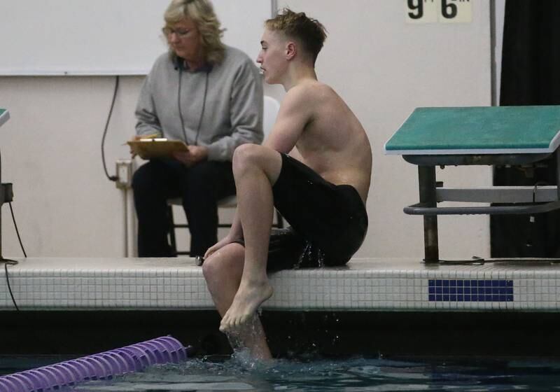 L-P Co-op's Caleb Strand exits the pool after competing in the 100 yard breaststroke event during a triangular meet against Morrison and Olympia on Wednesday, Jan. 22, 2025 at the Illinois Valley YMCA in Peru.