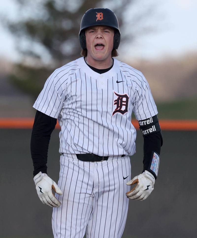 DeKalb's Brodie Farrell reacts at second base after driving in a run Tuesday, April 15, 2025, during their game against Naperville North at DeKalb High School.