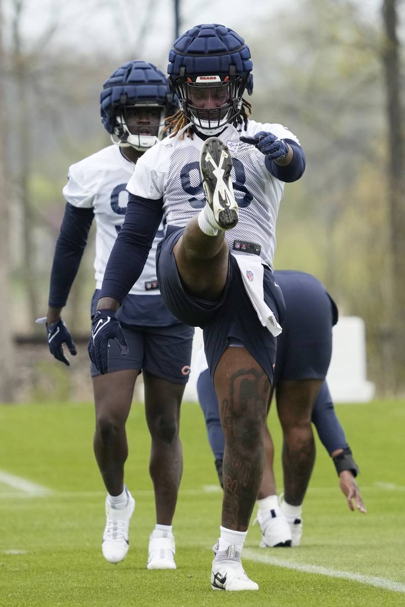 Chicago Bears defensive lineman Gervon Dexter warms up during the team's rookie minicamp, Saturday, May 6, 2023, at Halas Hall in Lake Forest.