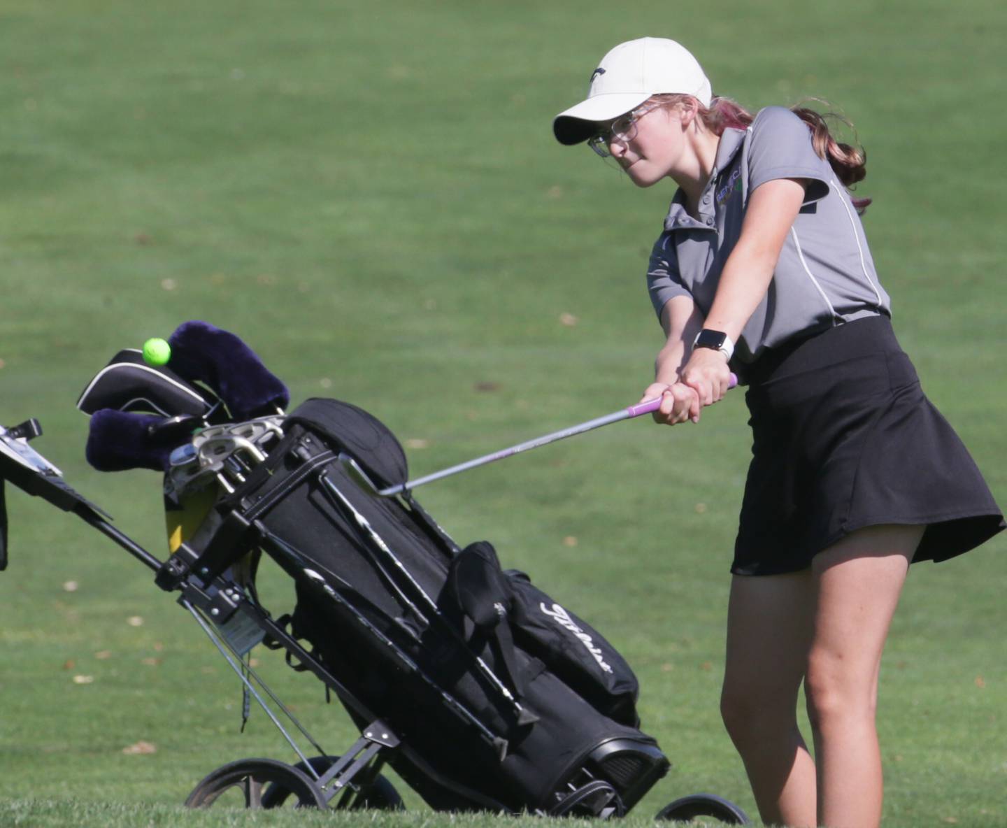 Seneca's Shelby Welsh hits her ball onto the green during the Tri-County Conference golf tournament on Wednesday, Sept. 21, 2022 at Wolf Creek Golf Club in Pontiac.