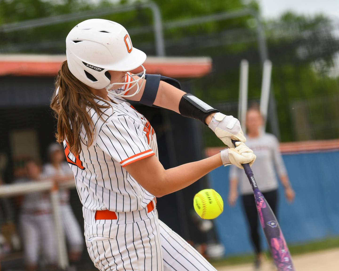 Oswego's Betsy Jack (19) makes contact with the ball during the regional final game on Friday May 22, 2026, while taking on Benet Academy held at Oswego High School.