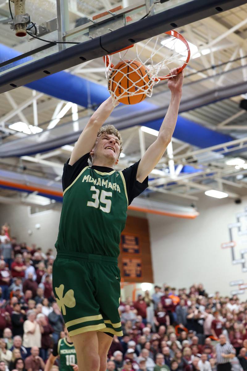 Bishop McNamara's Richard Darr completes a dunk during the Fightin' Irish's 77-70 loss to Tolono Unity in the IHSA Class 2A Pontiac Supersectional on Monday, March 9, 2026.