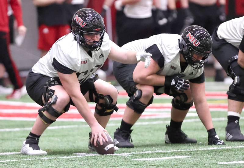 Northern Illinois center Seth Thompson calls out protections during the teams first spring practice Wednesday, March 22, 2023, in the Chessick Practice Center at Northern Illinois University in DeKalb.