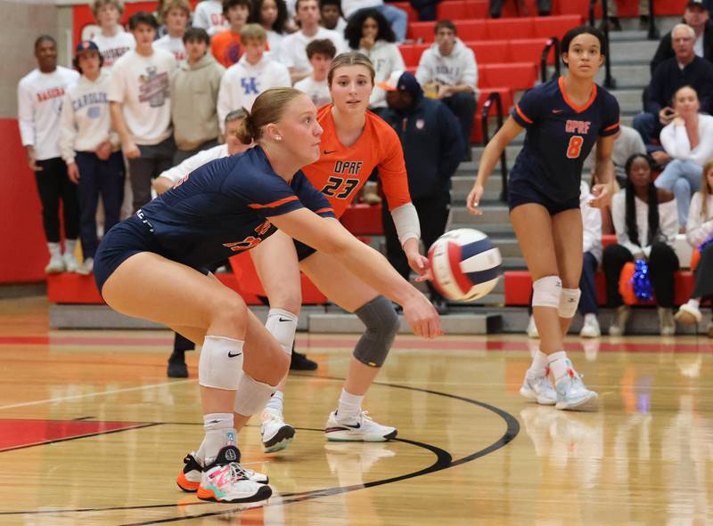 Oak Park-River Forest’s Grace Nelson (11) receives the ball against Willowbrook during the 4A girls varsity volleyball sectional final match at Hinsdale Central high school on Wednesday, Nov. 1, 2023 in Hinsdale, IL.