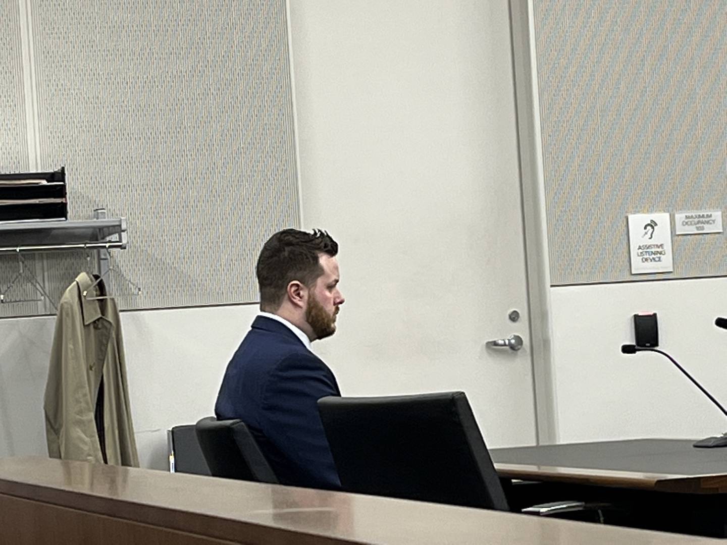 Sean Woulfe sits while his attorney George Lenard delivers opening statements on Wednesday, March 23, 2022 in the reckless homicide trial against him.