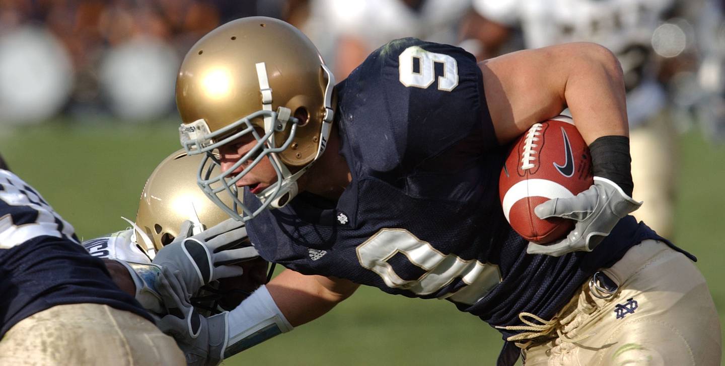 Notre Dame safety Tom Zbikowski, senior from Arlington Heights, Ill. returns a punt during the Irish 42-21 victory over Navy Nov. 12, 2005 in South Bend, Ind. Zbikowski is also a boxer who has been involved in talks to become a professional boxer and continue his college football career. (AP Photo/Joe Raymond)