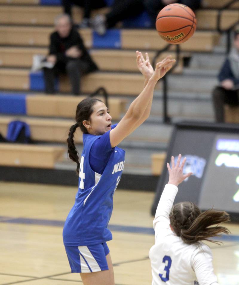 Wheaton North’s Sara Abdul attempts three points during the Class 4A St. Charles North Regional final against St. Charles North on Thursday, Feb. 16, 2023.