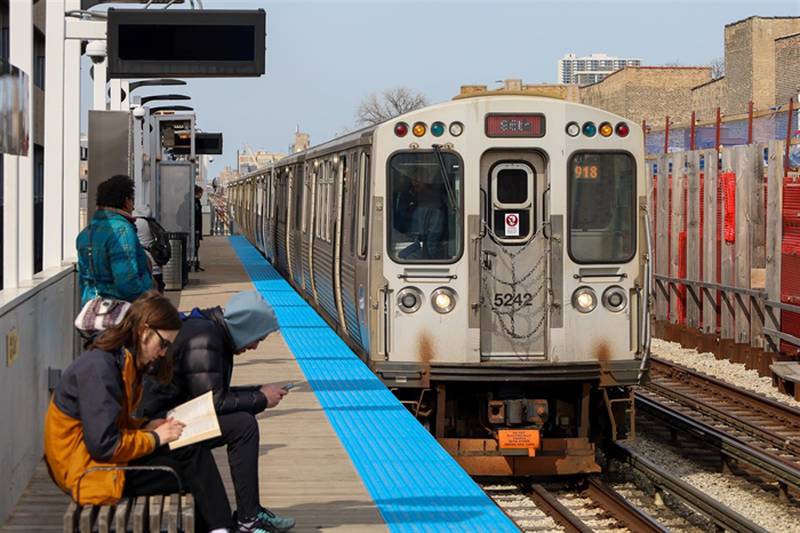 A CTA Red Line train rolls into the station in Chicago