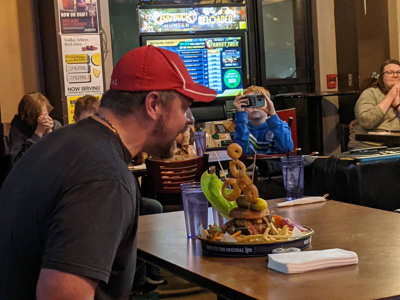 Those at Roadhouse 47 in Yorkville Jan. 26 cheered on professional eater and YouTube star Randy Santel as he dug into the four servings of fries that accompanied the Big Hoss burger.