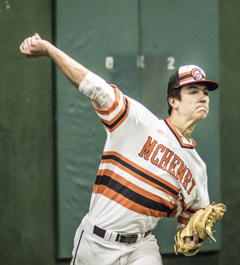 McHenry's Bobby Miller pitches during baseball practice at Pro Player Consultants in McHenry Tuesday, March 7, 2017.