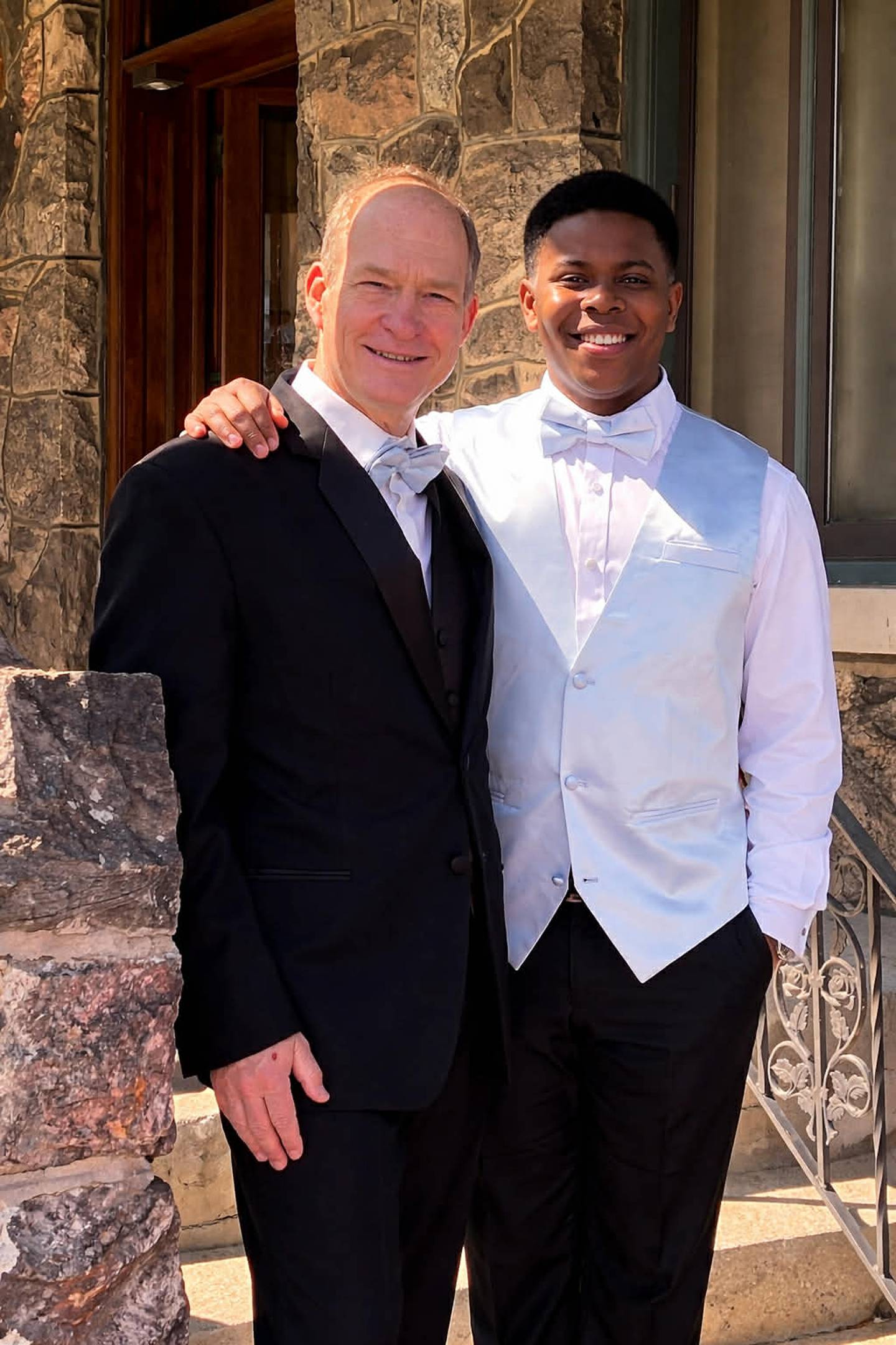 Bob Palkon of Joliet is seen with his son Frankie, age 10, at the wedding of Palkons daughter Mary Kate on Saturday, March 28, 2026.
