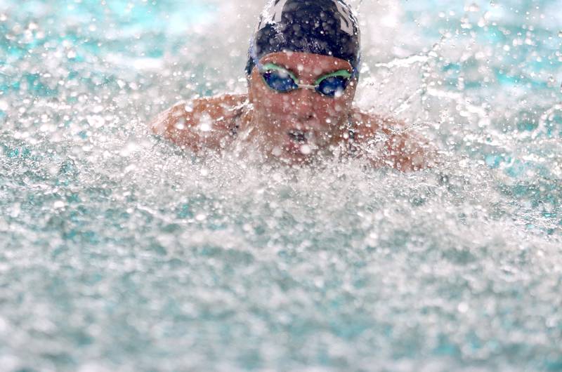 Dundee-Crown co-op’s Maggie Nowak competes in the 100-yard butterfly during the Fox Valley Conference Championship Meet at Woodstock North High School on Saturday, Nov. 2, 2024 in Woodstock .