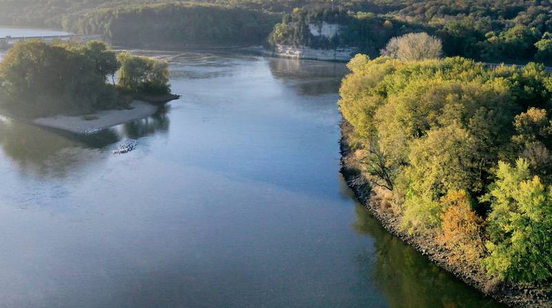Trees begin to turn color on Thursday, Oct. 23, 2025 at Starved Rock State Park. The fall colors have been late this season due to the dry drought conditions and warmer temperatures.
