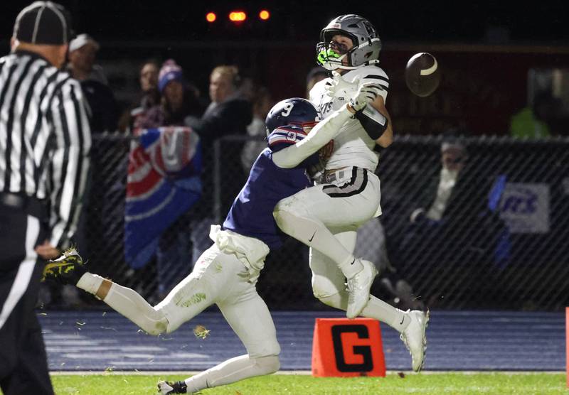 Kaneland's Brady Brown can’t quite haul in the pass as Belvidere North's Nolan Vaughn provides tight coverage Friday, Nov. 7, 2025, during their Class 5A second round playoff game at Belvidere North High School.