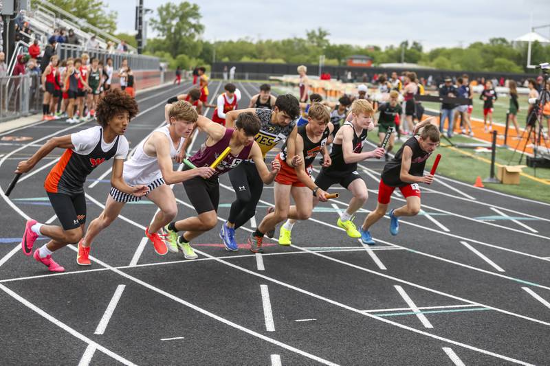 Runners start in the 4x800m at the Class 3A Minooka Sectional Boys Track and Field Meet Wednesday, May 21, 2025 in Minooka.