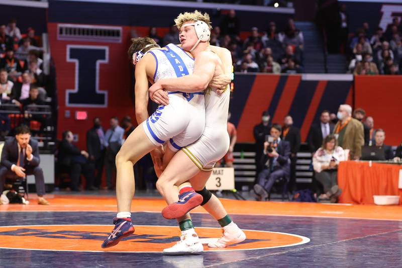 Lockport’s Brayden Thompson looks to throw Marmion’s Tyler Perry in the Class 3A 170lb. championship match at State Farm Center in Champaign. Saturday, Feb. 19, 2022, in Champaign.