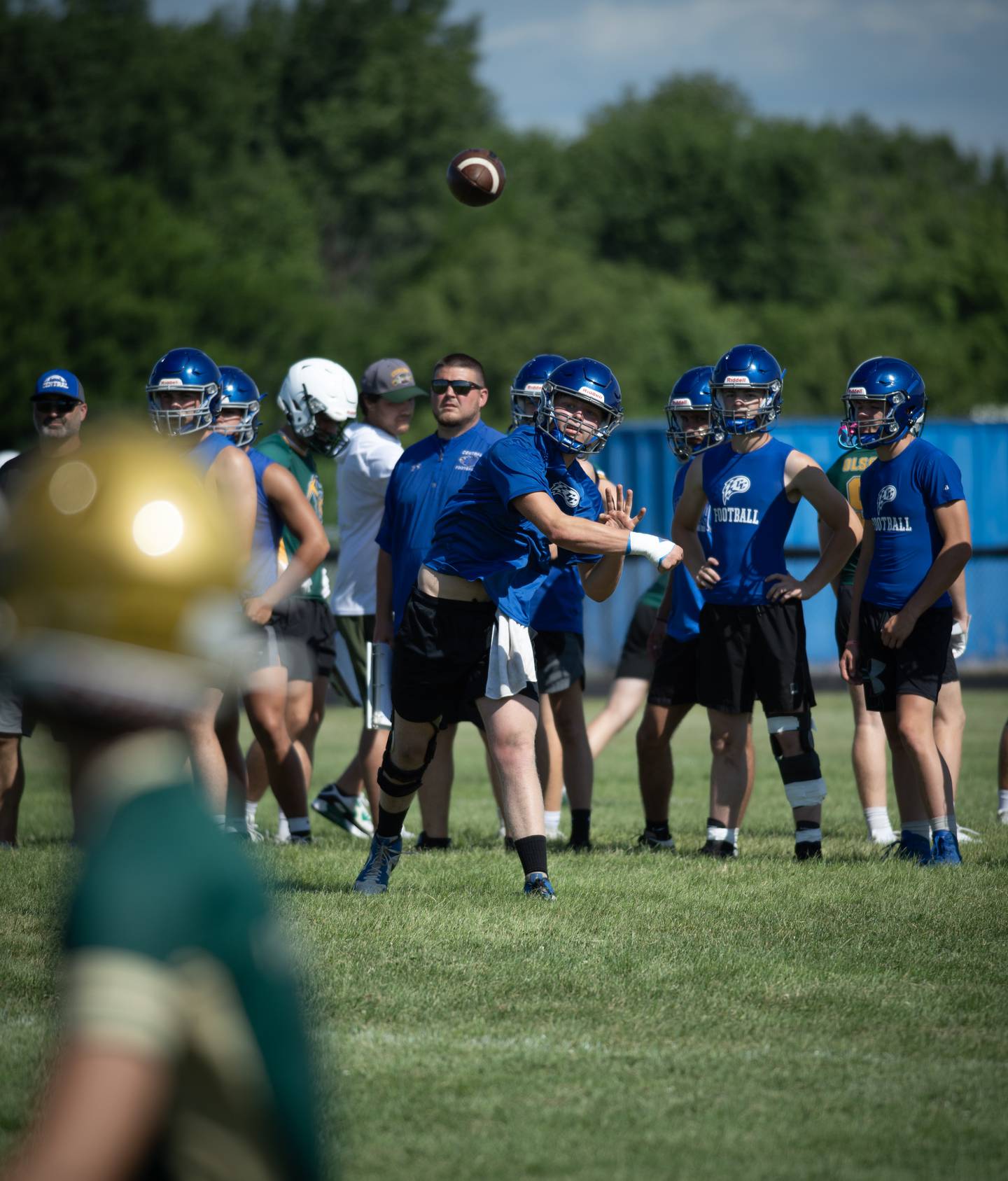 A Central High School player passes during the 7 on 7 football at Central High School on Saturday, July 12, 2025.
