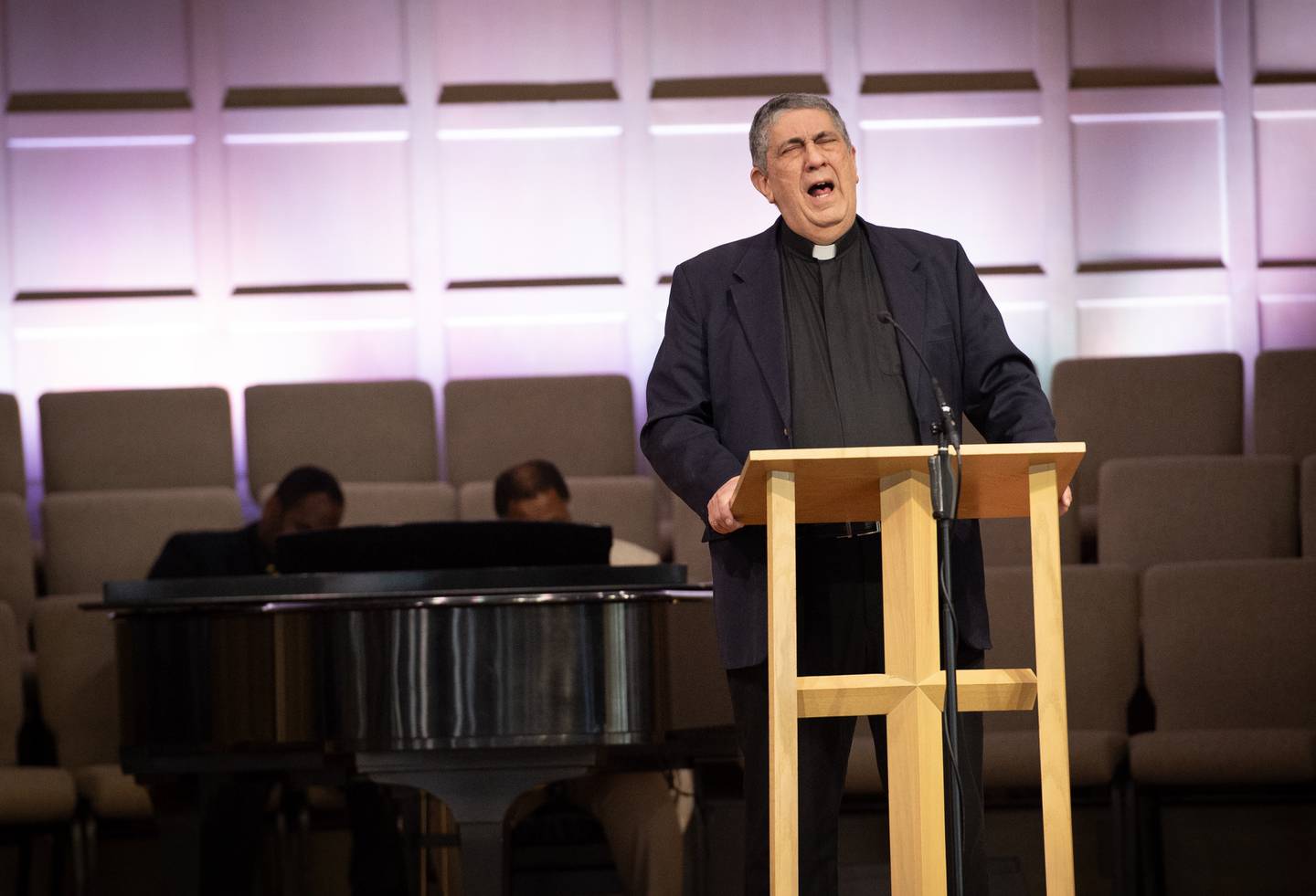 Father Nick Greanias, with the Kankakee Greek Orthodox Church, sings during the annual Dr. Martin Luther King Jr. Ecumenical Service at Olivet Nazarene University's College Church on Monday, January 19, 2026.