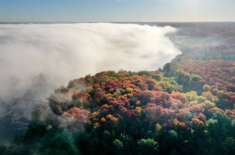 Fog begins to lift from the Illinois River on Thursday, Oct. 24, 2024 in Starved Rock State Park.