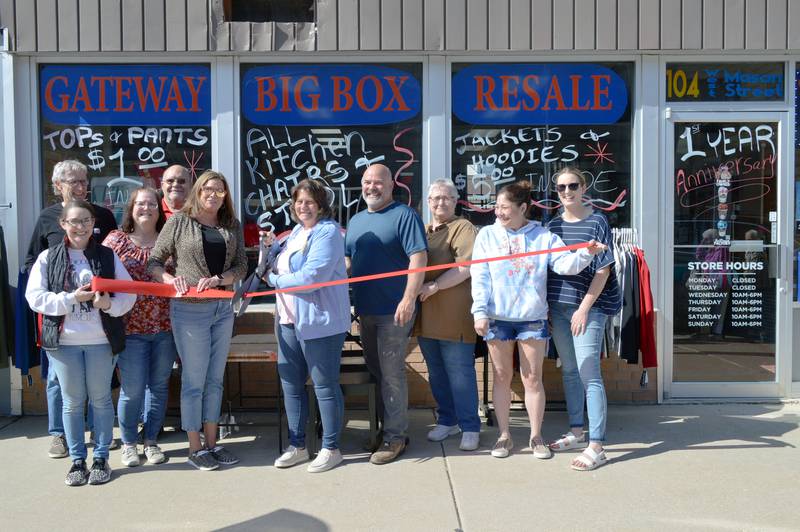 Two connected Polo businesses — Gateway Big Box Resale and Kim's Gateway Antiques — celebrated their one-year anniversary on April 28, 2023, with a ribbon-cutting. Left to right are Mark Scholl; Polo City Clerk Sydney Bartelt; First State Bank Branch Manager Pam White; Polo Mayor Doug Knapp; Polo Chamber of Commerce Vice President Tamela Merdian; co-owners Jodi Horner and Shannan Haenitsch; store employee Sheala Wells; Chamber member Namiko Sheely; and Chamber Secretary Megan White.