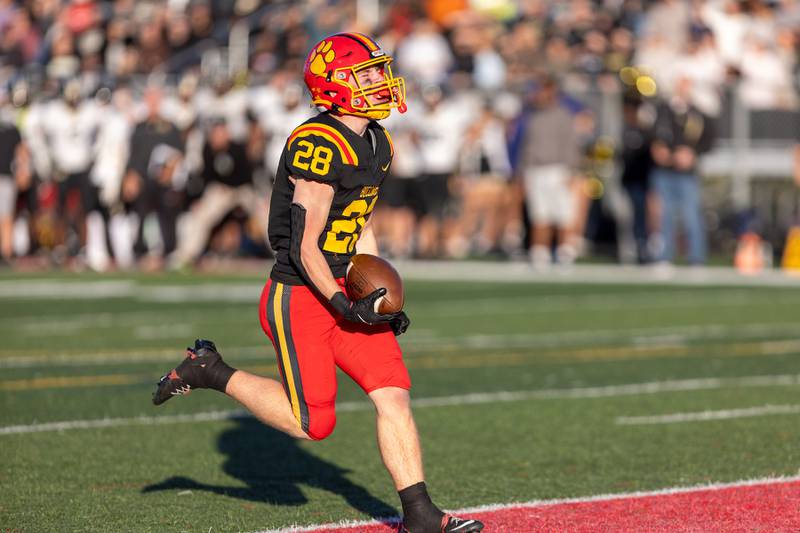 Batavia's Henry Hahn runs the ball in for a touchdown against Glenbard North at the Class 7A Quarter Final on Saturday, Nov.15,2025 in Batavia.