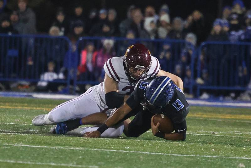 Loyola’s Max Mendoza brings down Lincoln-Way East’s Jonas Williams in the Class 8A semifinal on Saturday, Nov. 23, 2024 in Frankfort.