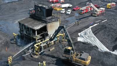 Photos: Three-alarm fire breaks out at Washington Mills near Hennepin