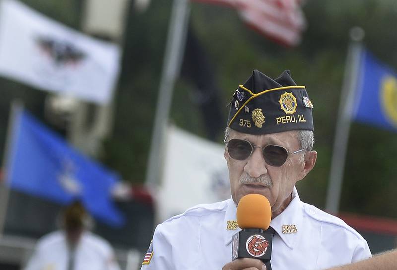 Phil Valle, chaplain of Peru American Legion Post 375, speaks during the ceremony Saturday, Aug. 26, 2023, at Veterans Memorial Park in Peru during a ceremony honoring those memorialized on the Vietnam Traveling Memorial Wall.