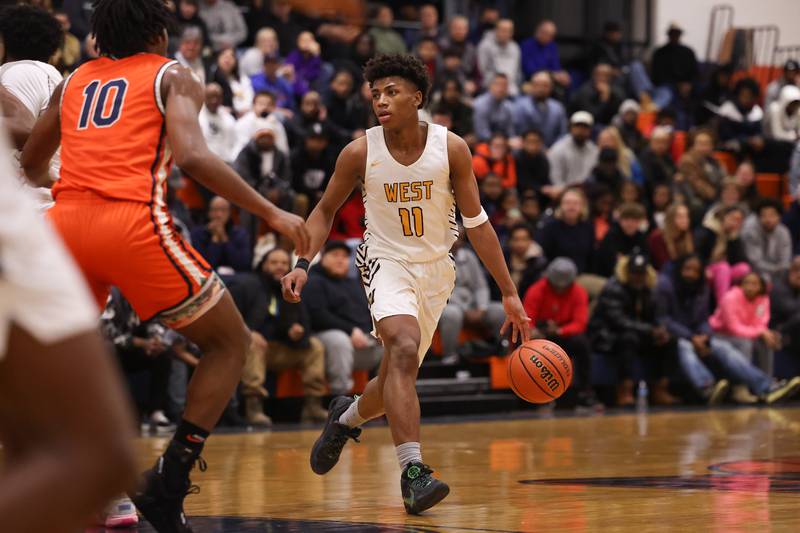 Joliet West’s Jeremy Fears looks for a play against Romeoville on Tuesday January 31st, 2023.