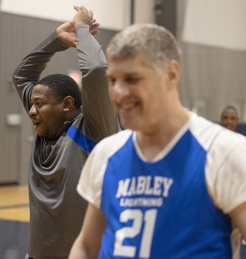 Coach Eli Townsend celebrates a good practice Wednesday, Dec. 18, 2024, with his Mabley Center team. The bracketed tournament will start in January in Byron.