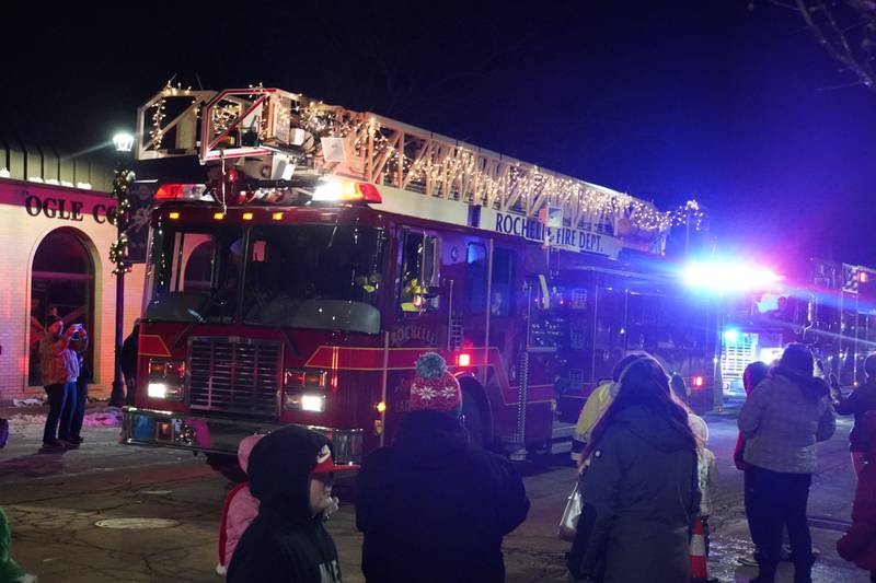 A Rochelle Fire Department truck drives in Rochelle's lighted Christmas parade on Friday, Dec. 5, 2025.