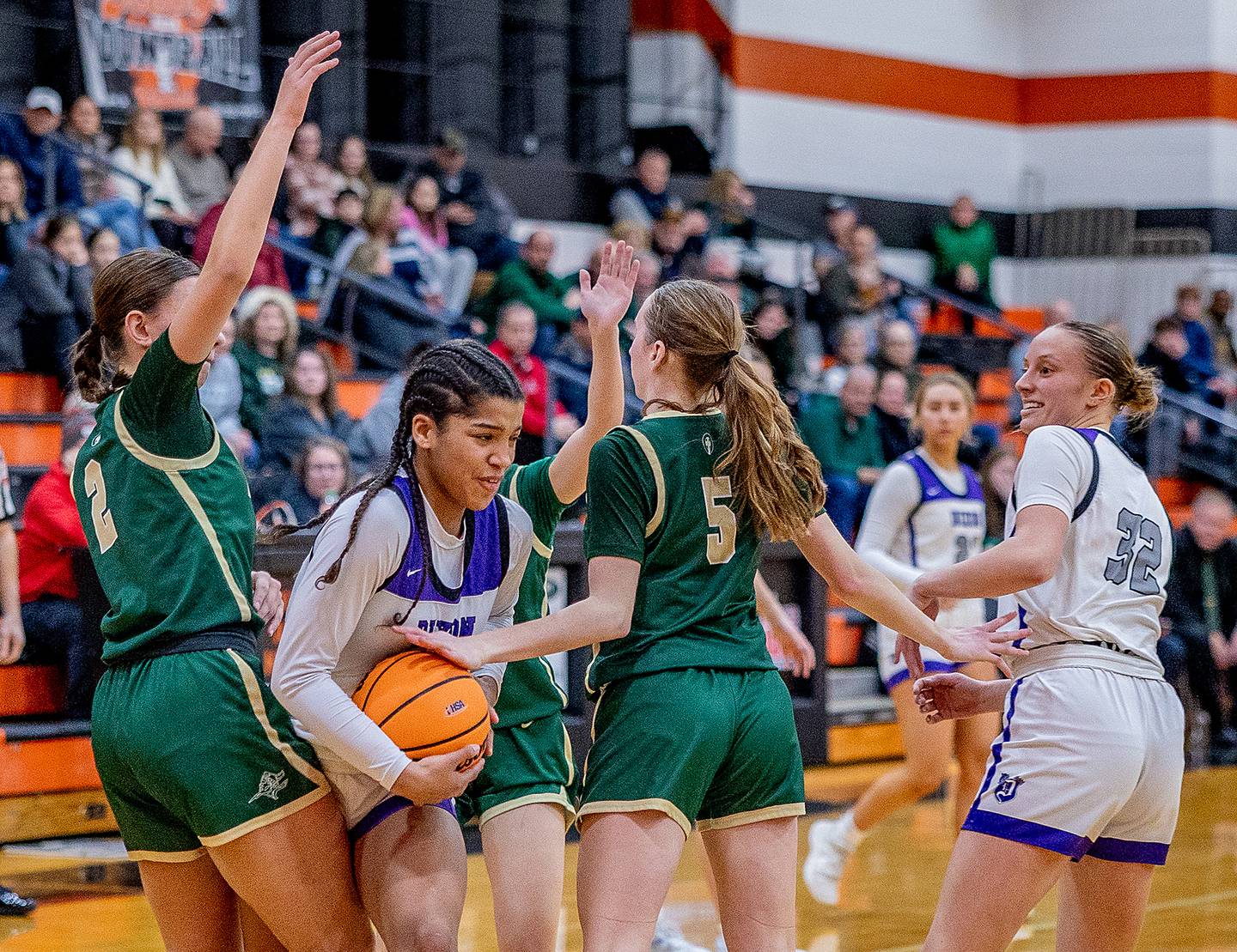Dixon sophomore Ahmyrie McGowan splits the Boylan defense during the Freeport regional championship on Thursday, February 20, 2025.