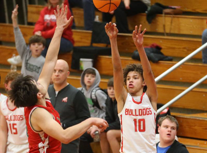 Streator's Christian Bruton lets go of a shot over L-P's Erick Sotelo on Tuesday, Jan. 13, 2026 in Pops Dale Gymnasium at Streator High School.
