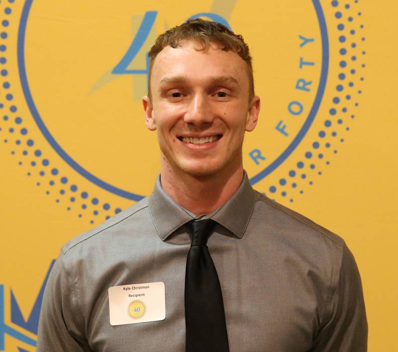 Kyle Christman, Senior Teller, Heartland Bank in Peru poses for a photo during the Illinois Valley Chamber of Commerce 40 Under Forty Awards Gala on Thursday, Feb. 9, 2023 at Westclox in Peru.