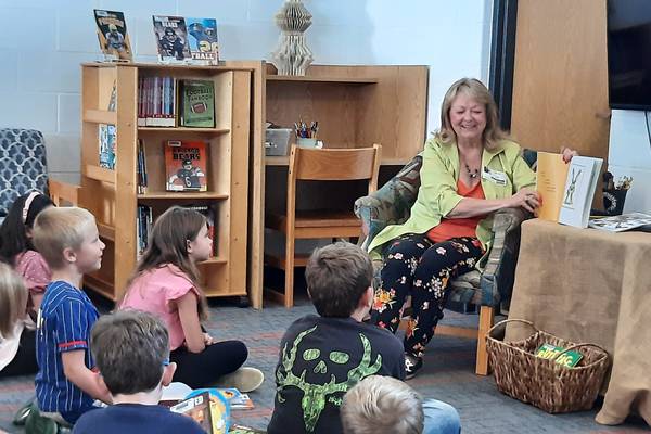 Local author Lee reads at Monroe Center School