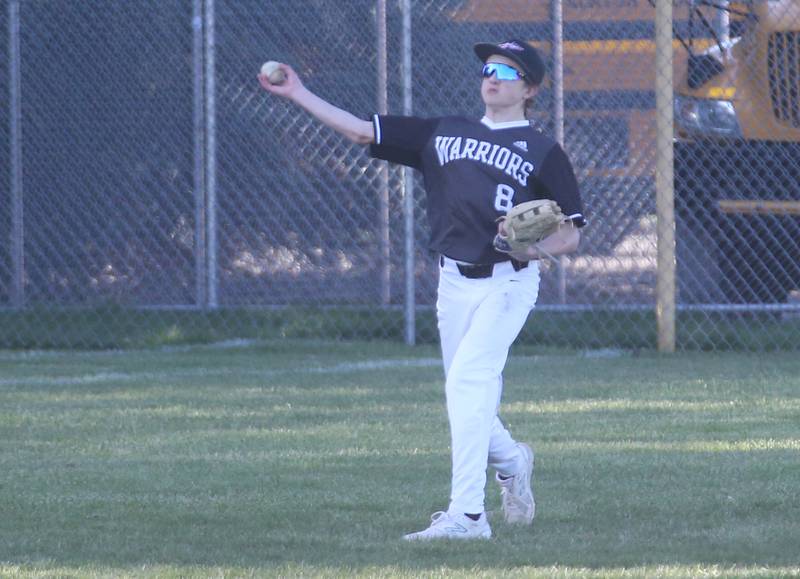 Woodland/Flanagan-Cornell's Jack Starkey throws the ball back into the infield after fielding a ground ball against Putnam County on Tuesday, April 9, 2024 at Woodland High School.