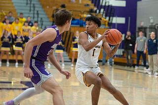 Sterling's Tyree Kelly handles the ball against Rochelle in the regional finals Friday, Feb. 25, 20212.