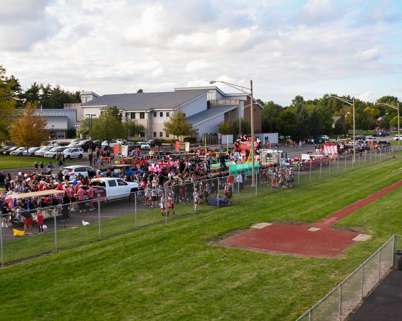 Yorkville parade participants line up outside of the high school football stadium in Yorkville before the start of the homecoming parade on Thursday, Sept. 28, 2023.