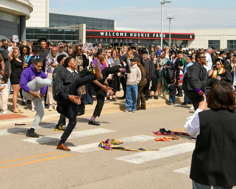 Northern Illinois University members from the Omega Psi Phi fraternity do a routine after the Northern Illinois University graduation ceremony on Saturday May 9, 2026, held at the Convocation Center in DeKalb.