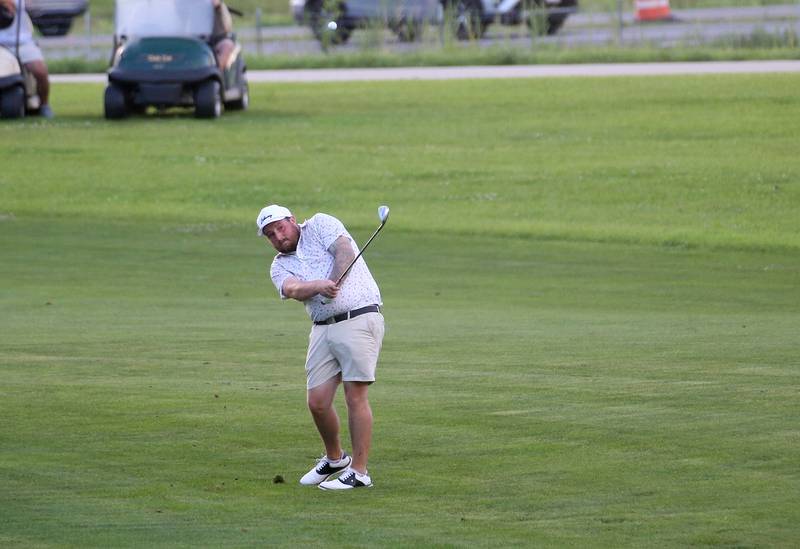 Patrick Guilfoyle hits toward the green during the Illinois Valley Mens Golf Championship Tournament on Sunday, July 27, 2025 at Spring Creek Golf Course in Spring Valley.